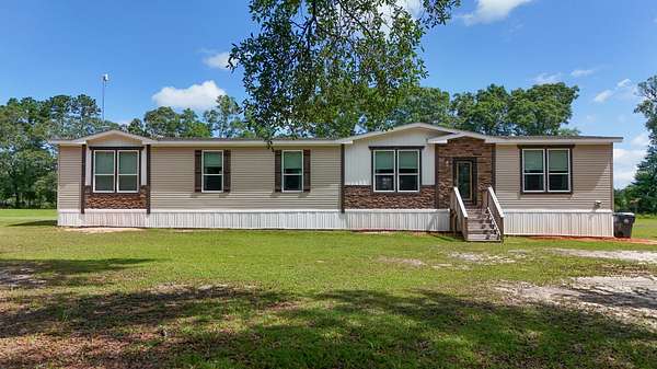 5.22 Acres of Residential Land with Home for Sale in Ponce de Leon, Florida