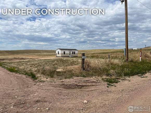 35 Acres of Agricultural Land with Home for Sale in Nunn, Colorado
