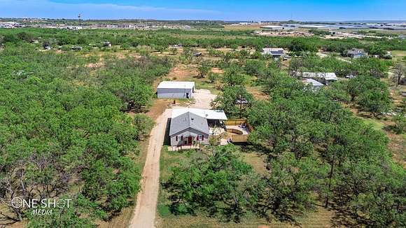2 Acres of Residential Land with Home for Sale in Sweetwater, Texas