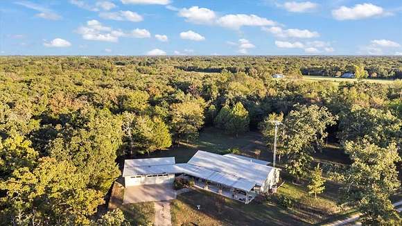 11.76 Acres of Recreational Land with Home for Sale in Emory, Texas