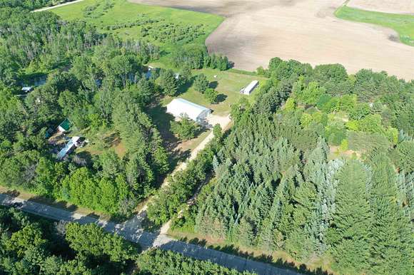 3.7 Acres of Residential Land with Home for Sale in Neshkoro, Wisconsin