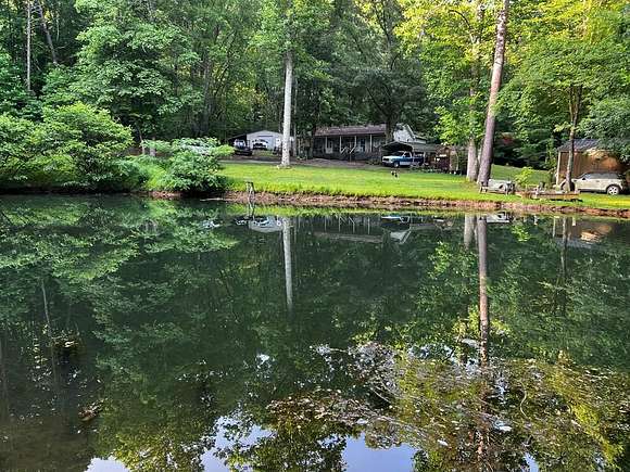 3.1 Acres of Residential Land with Home for Sale in Hiawassee, Georgia