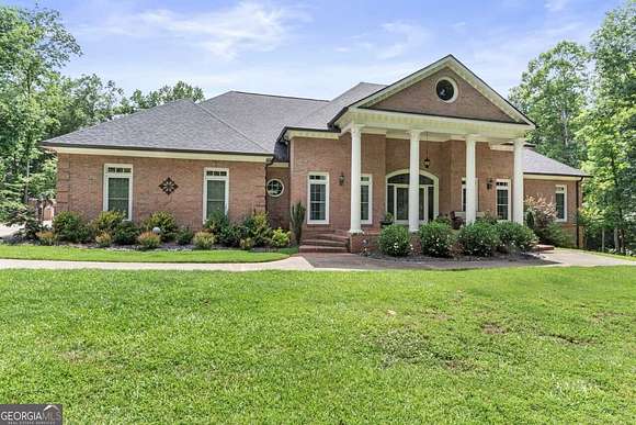 11.02 Acres of Land with Home for Sale in Senoia, Georgia