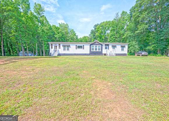3.1 Acres of Residential Land with Home for Sale in Carnesville, Georgia