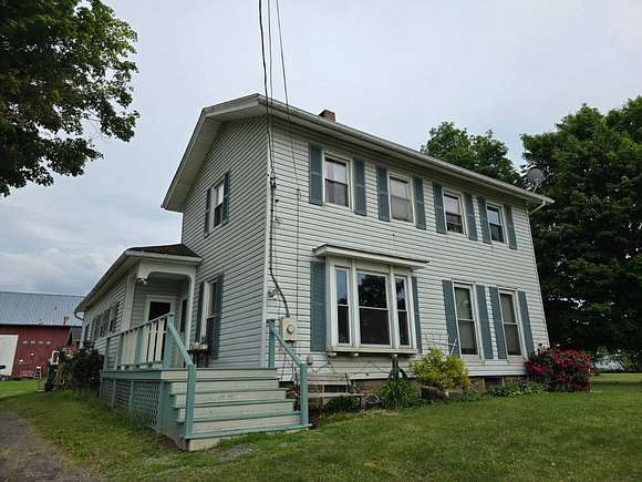 3.3 Acres of Land with Home for Sale in Bergen, New York