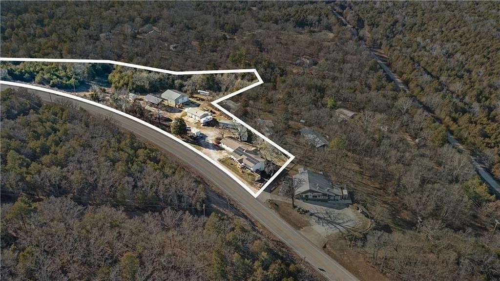 4.7 Acres of Residential Land with Home for Sale in Eureka Springs, Arkansas