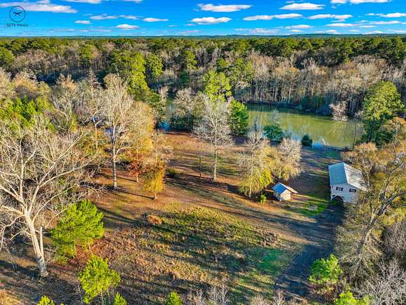 4.63 Acres of Residential Land with Home for Sale in Jasper, Texas