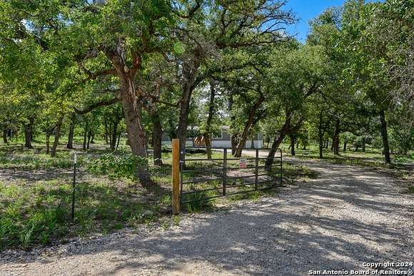 2.5 Acres of Residential Land with Home for Sale in La Vernia, Texas