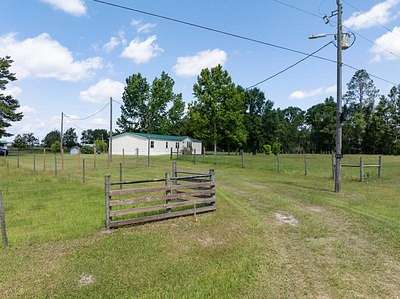 10 Acres of Residential Land with Home for Sale in Live Oak, Florida