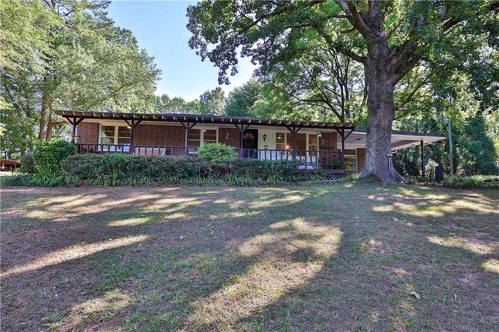 5.9 Acres of Residential Land with Home for Sale in Kennesaw, Georgia