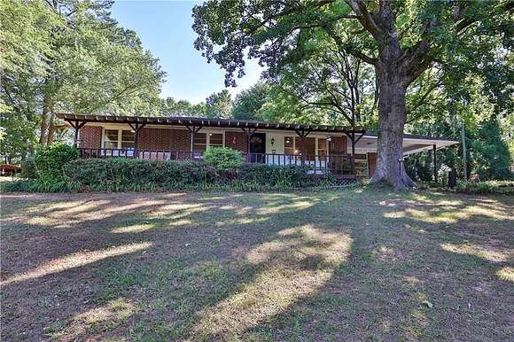 5.9 Acres of Residential Land with Home for Sale in Kennesaw, Georgia