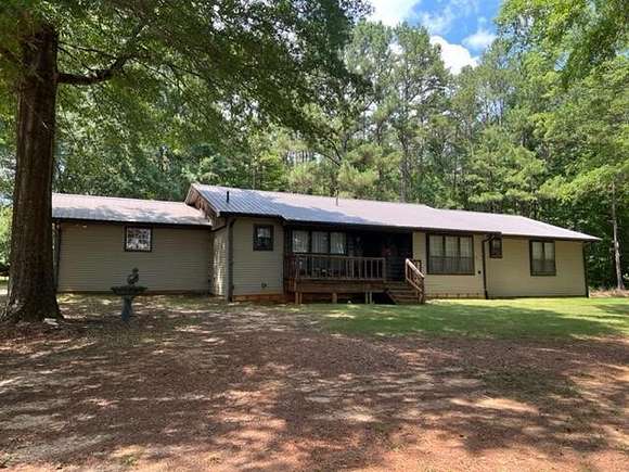 11.6 Acres of Land with Home for Sale in Booneville, Mississippi