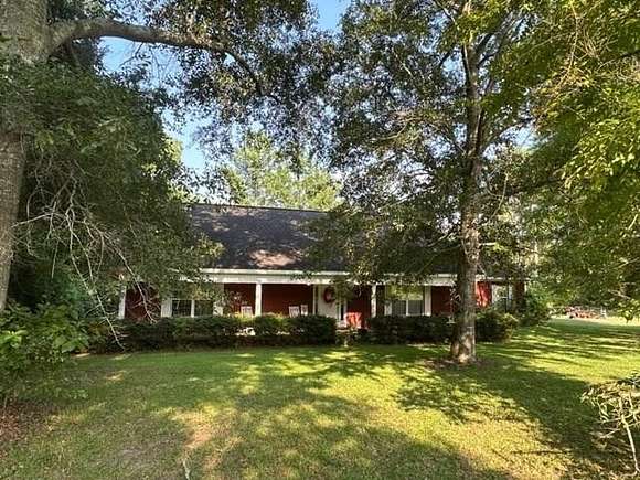 6.7 Acres of Residential Land with Home for Sale in Slocomb, Alabama