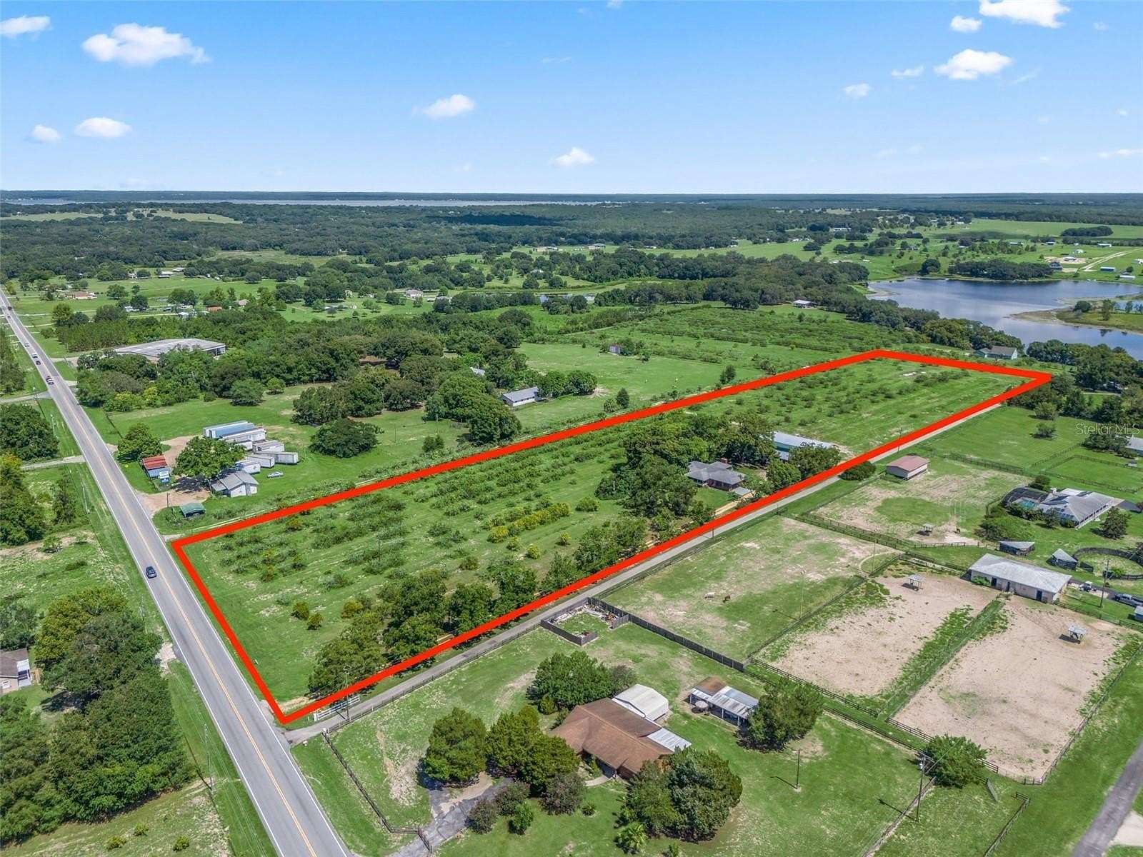 13.22 Acres of Land with Home for Sale in Weirsdale, Florida