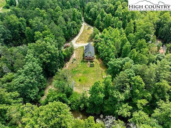 6.77 Acres of Residential Land with Home for Sale in Traphill, North Carolina