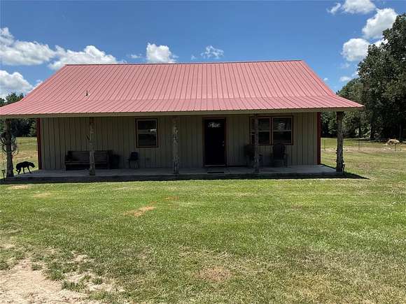 78 Acres of Land with Home for Sale in Bogata, Texas
