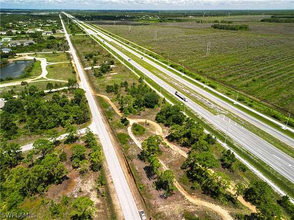 0.54 Acres of Commercial Land for Sale in Lehigh Acres, Florida
