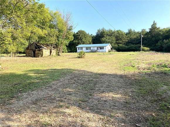 74 Acres of Land with Home for Sale in Altus, Arkansas