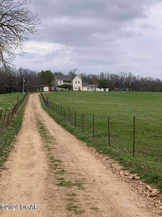 18.8 Acres of Land with Home for Sale in Stella, Missouri