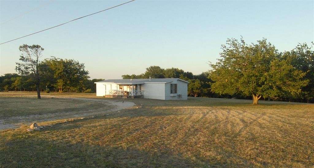 2.805 Acres of Residential Land with Home for Sale in Cresson, Texas
