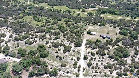 14.71 Acres of Land with Home for Sale in Kempner, Texas
