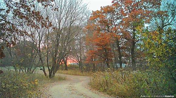 62 Acres of Land with Home for Sale in Spencer Brook Township, Minnesota