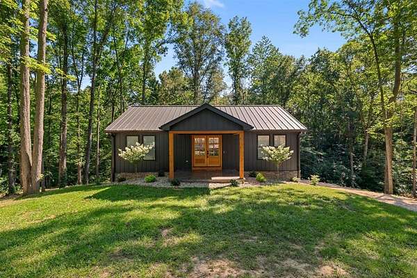 12.5 Acres of Land with Home for Sale in Canmer, Kentucky