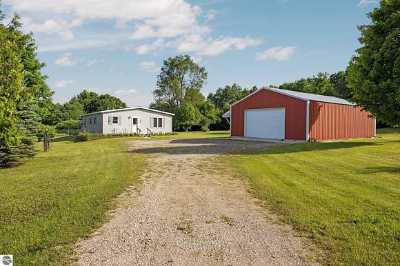 20 Acres of Land with Home for Sale in Benzonia, Michigan