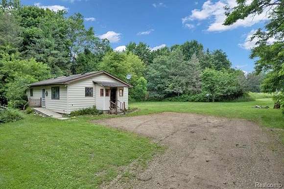 10 Acres of Land with Home for Sale in North Branch, Michigan