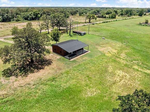 55.38 Acres of Recreational Land with Home for Sale in Sumner, Texas