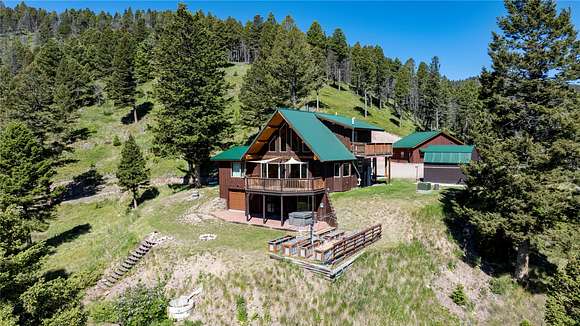 20.044 Acres of Recreational Land with Home for Sale in Canyon Creek, Montana