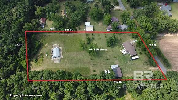 3.56 Acres of Residential Land with Home for Sale in Century, Florida