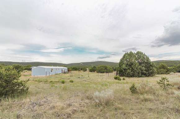 10 Acres of Residential Land with Home for Sale in Tijeras, New Mexico