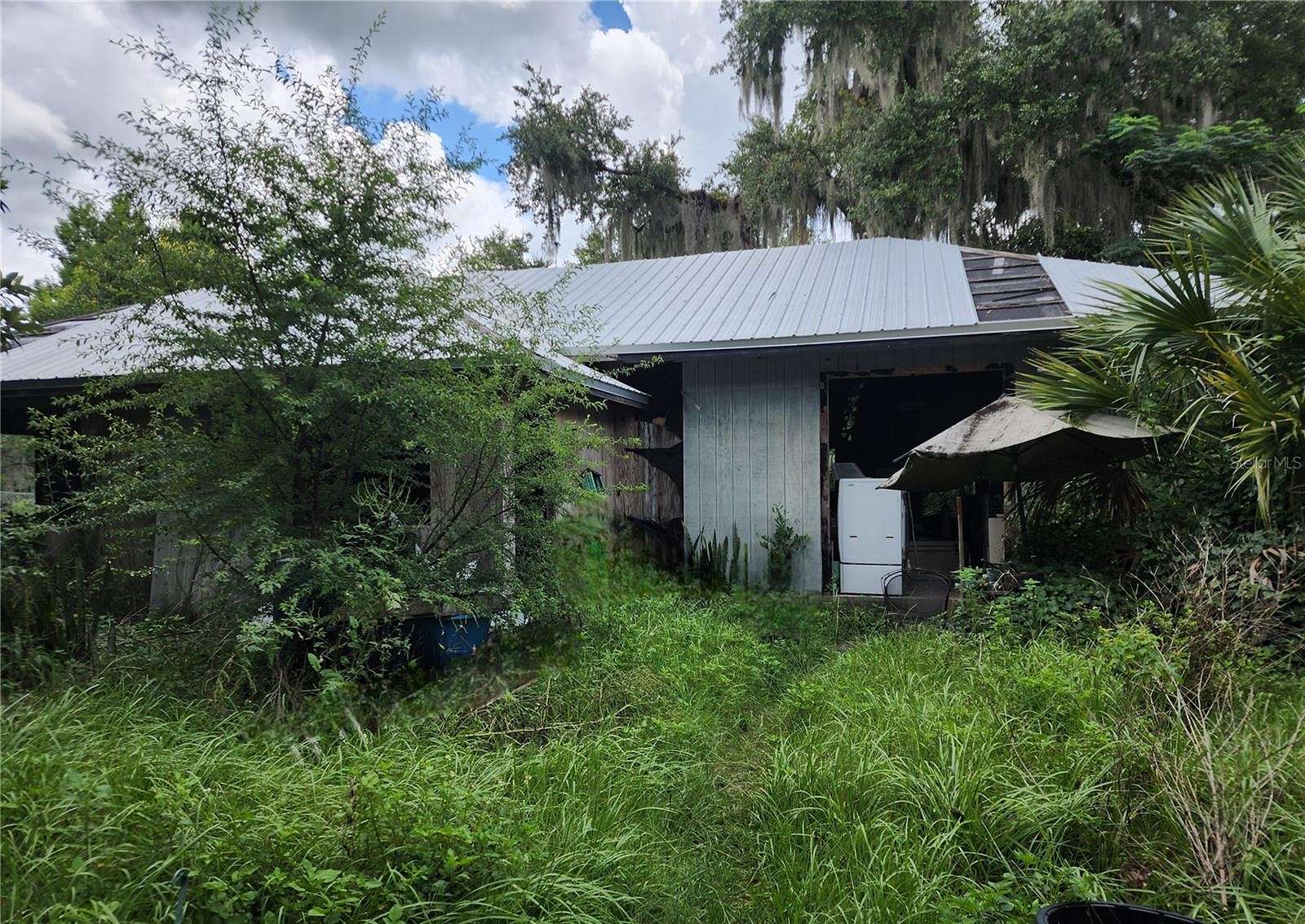 2.34 Acres of Residential Land with Home for Sale in Osteen, Florida