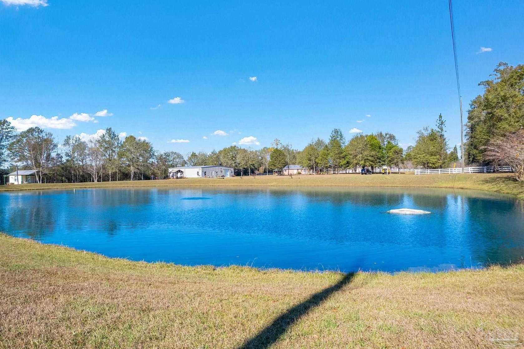 3.765 Acres of Residential Land with Home for Sale in Molino, Florida