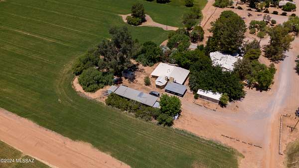 127 Acres of Agricultural Land with Home for Sale in Marana, Arizona