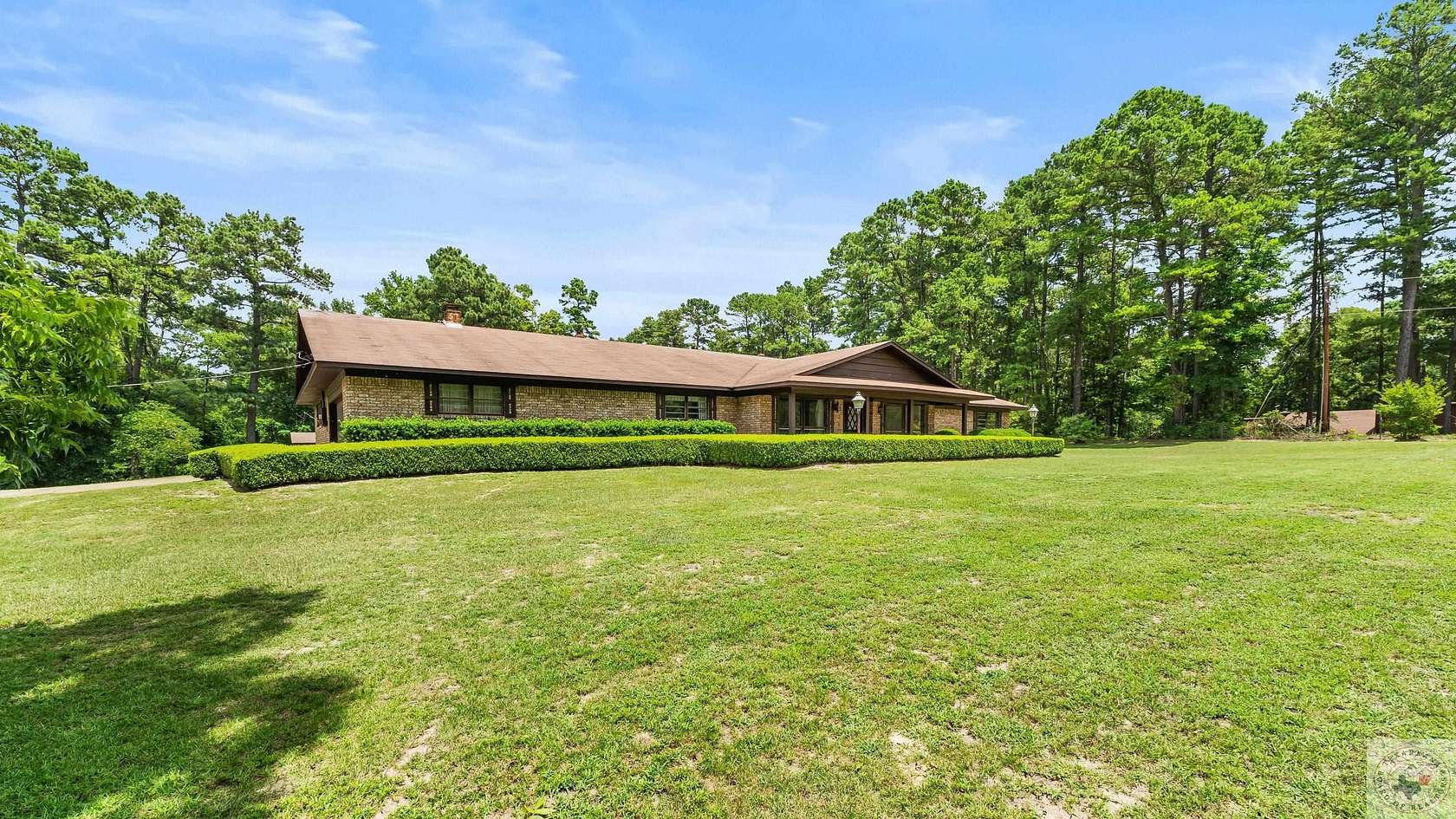 10 Acres of Residential Land with Home for Sale in Atlanta, Texas