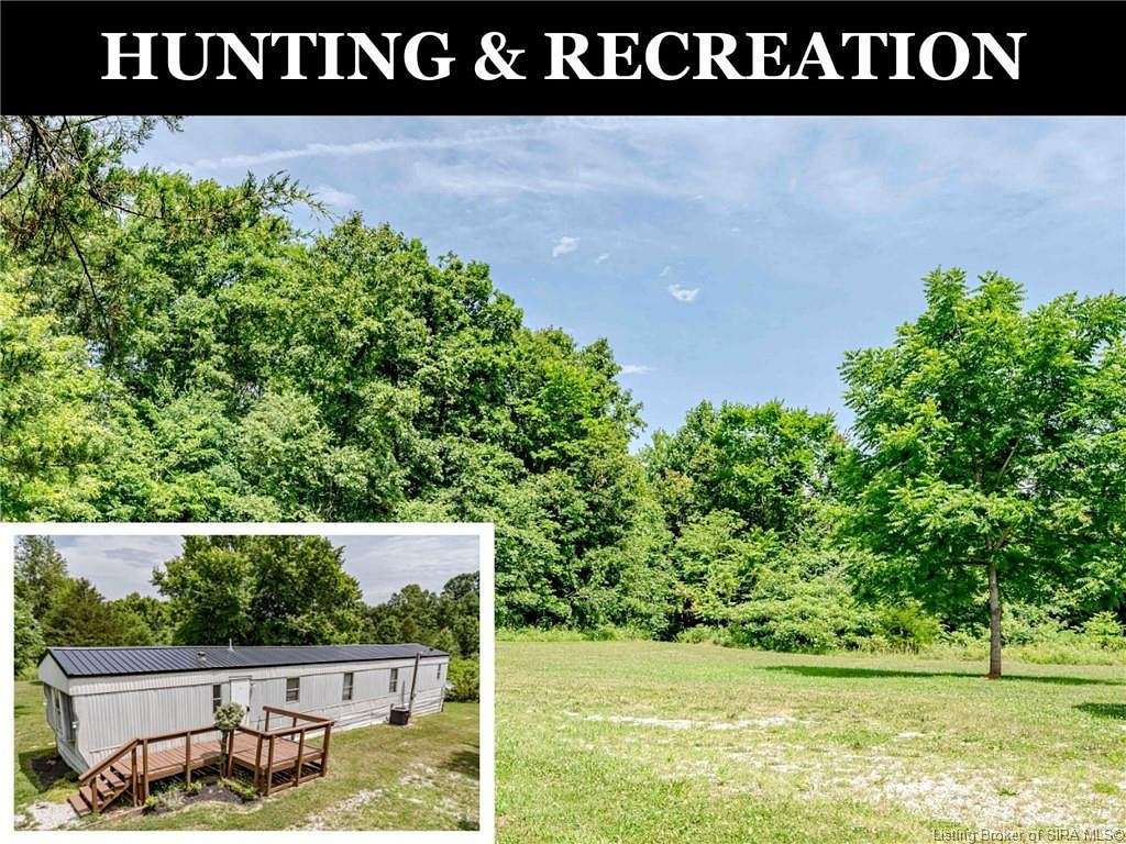 14.067 Acres of Recreational Land with Home for Auction in Fredericksburg, Indiana