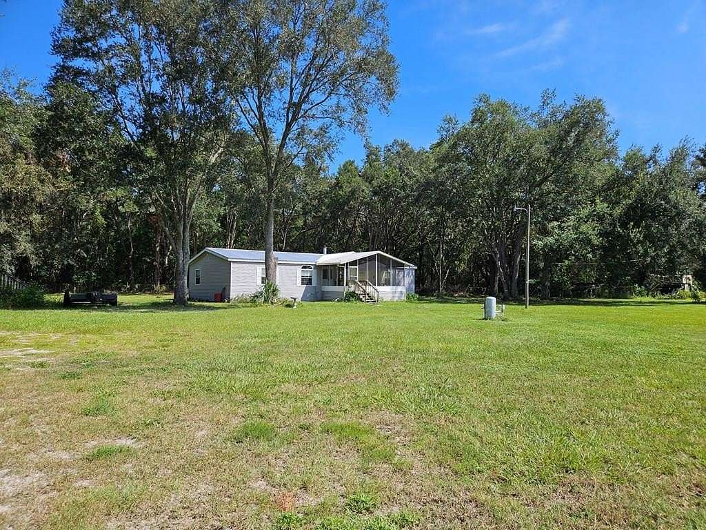 10 Acres of Land with Home for Sale in Chiefland, Florida