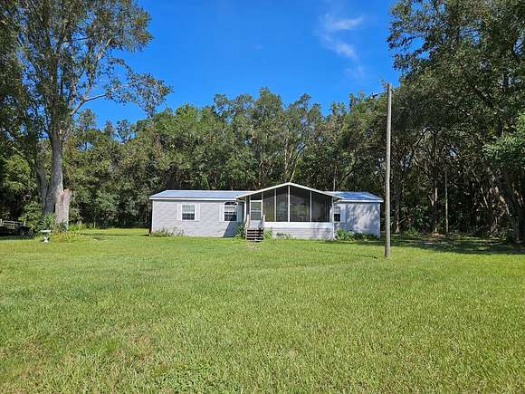 10 Acres of Land with Home for Sale in Chiefland, Florida