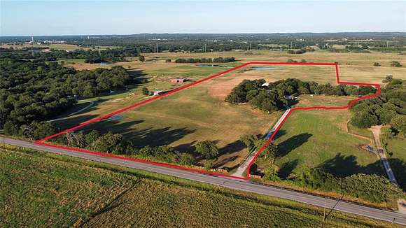 32.943 Acres of Agricultural Land with Home for Sale in Alvord, Texas