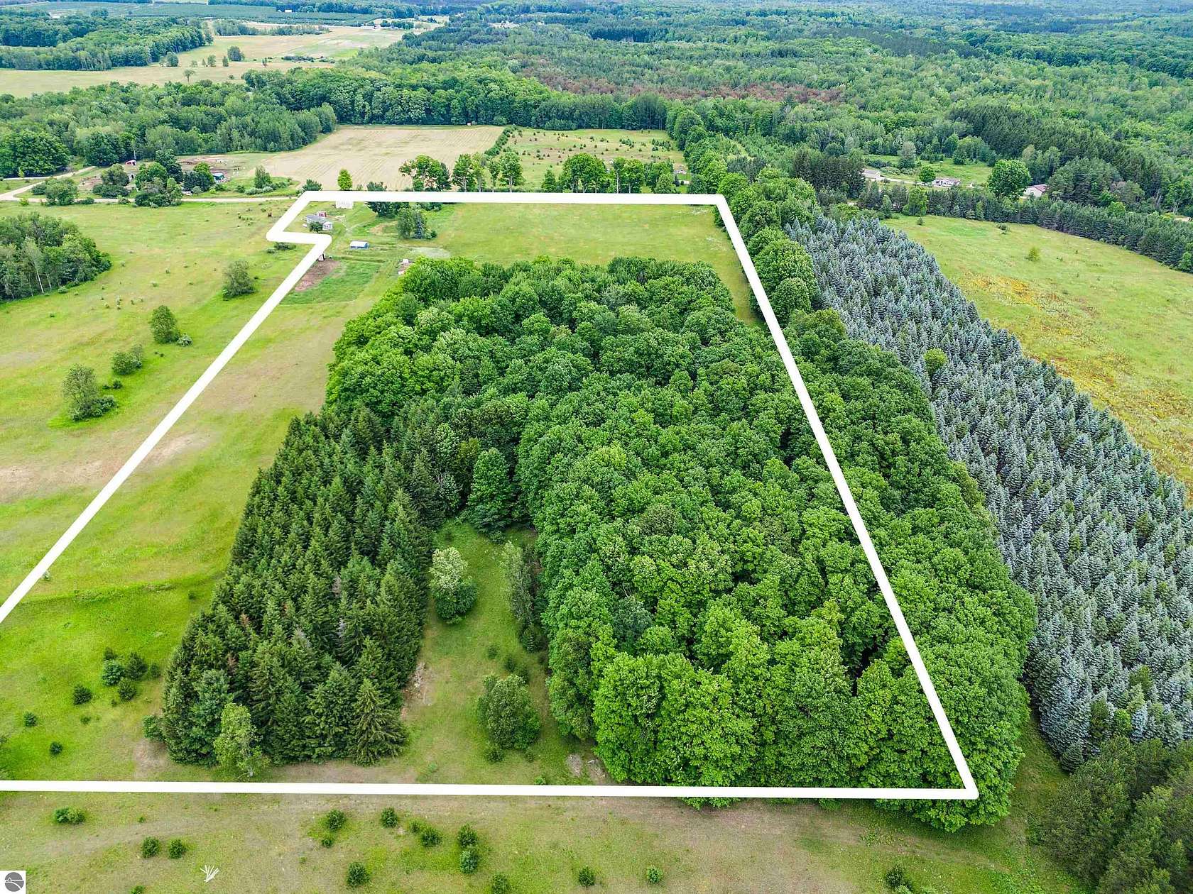 20 Acres of Agricultural Land with Home for Sale in Kingsley, Michigan