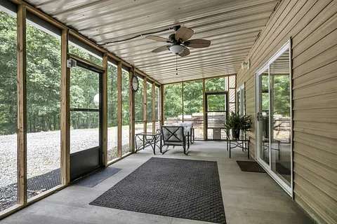 Screened in patio for relaxing and listening to the sounds of nature.