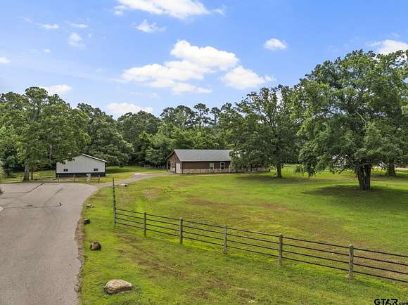 5.41 Acres of Residential Land with Home for Sale in Scroggins, Texas