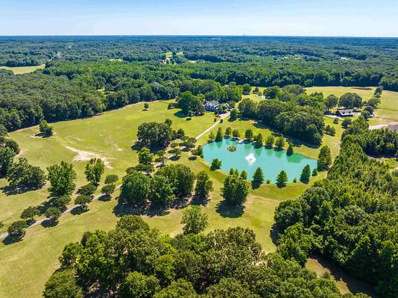 88.4 Acres of Land with Home for Sale in Eads, Tennessee