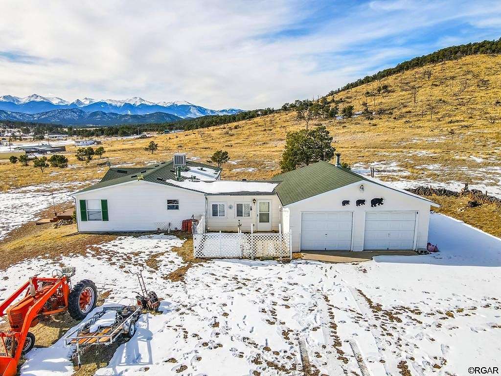 4.83 Acres of Residential Land with Home for Sale in Cotopaxi, Colorado