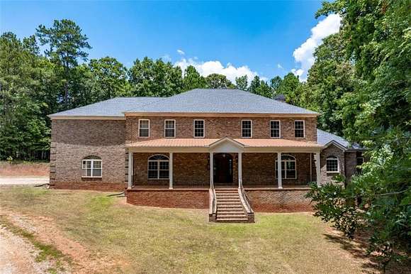 12.59 Acres of Land with Home for Sale in Monticello, Georgia