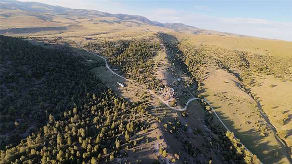19.598 Acres of Land with Home for Sale in Garrison, Montana
