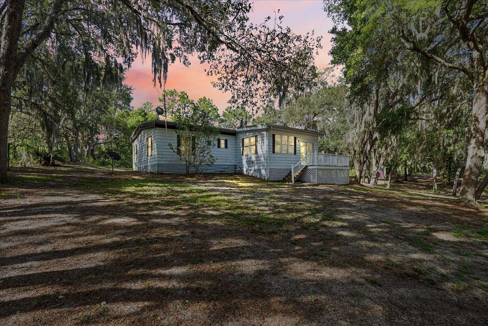 2.31 Acres of Residential Land with Home for Sale in Crescent City, Florida