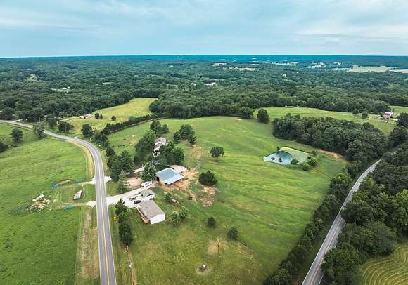 13.4 Acres of Land with Home for Sale in Tebbetts, Missouri